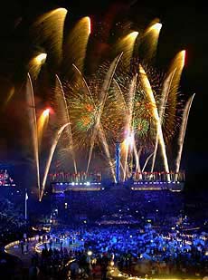 Fireworks burst over athletes