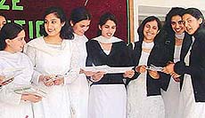 Some of the prize winners of the Government College for Girls, Sector 11, Chandigarh, after the annual prize distribution on Tuesday.