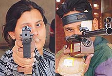 Priti Sharma (left) of Chandigarh aims during the sports pistol event and Surinder Pal of Punjab at air rifle OSNR senior men civilian and open event during the 26th Northern India Shooting Championship in Chandigarh on Tuesday.