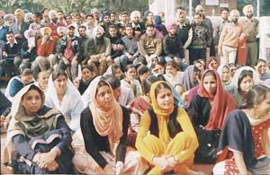 Saru Rana (extreme left) participates in a protest 