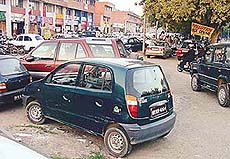 Haphazard parking of vehicles in front of hotels in Sector 35, Chandigarh.