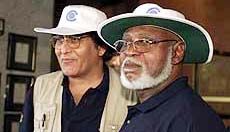 Commonwealth Head of the Zimbabwe Election Observer Mission General Abdulsalami Abubakar from Nigeria after bidding farewell to India's Member of Parliament and actor Vinod Khanna