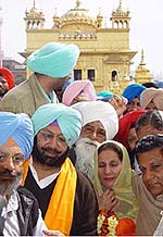 Capt Amarinder Singh and his wife Parneet Kaur at the Golden Temple on Thursday.