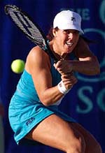 Jennifer Capriati returns a volley 