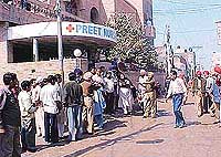 Police disperses the mob outside Preet Nursing Home in Ludhiana on Sunday morning.