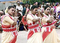 Sex workers dance during the inauguration ceremony of a week-long carnival in Kolkata 