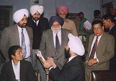 Mr Justice H.S. Bedi of the Punjab and Haryana High Court at a lok adalat in Amritsar on Sunday.