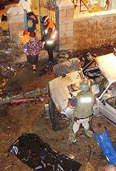 Residents are evacuated from the scene of a suicide bombing in Jerusalem 