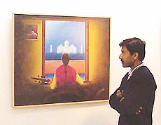 A visitor appreciates an exhibit at the 74th All-India Annual Art Show at the AIFACS art gallery, Swastik Vihar, Panchkula.