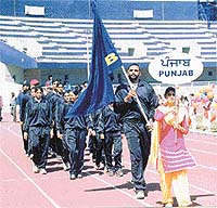 The Punjab contingent at the opening ceremony of the 52nd Senior National Basketball Championship in Guru Nanak Stadium, Ludhiana, on Tuesday. 