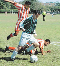 Forward of AG Audit Club (Haryana) Vinay Kanwar tries to control the ball in the match against Nivia Sport Club, Kota, in the second division National Football League match in Chandigarh on Tuesday. 