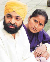 Harpal Singh with his wife Amarjit Kaur relate their tale of woes at PGI on Wednesday. 