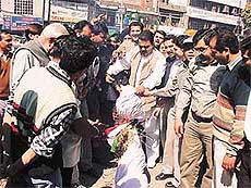 BJP workers set fire to an effigy of the Congress president Sonia Gandhi in Ludhiana on Wednesday.