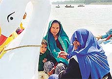 Women from Kakrali village, near Barwala, enjoy at the Sukhna Lake during celebrations of International Women�s Day organised by the Community Medicine Department of the PGI. 