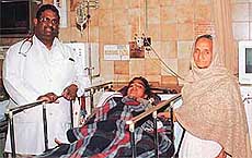 Dr Basant Pawar with Kiran Bala and her mother in a ward of Christian Medical College and Hospital, Ludhiana.