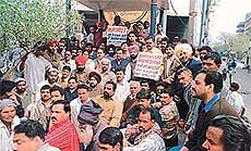 YC activists hold a rally in protest against communal violence, in Ludhiana on Friday.