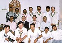 The EPF Headquarters team, which won the Inter-Office EPF Cricket Tournament in the Capital, with the trophy.
