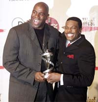 NBA legend Earvin "Magic" Johnson (left) and actor-comedian Chris Tucker