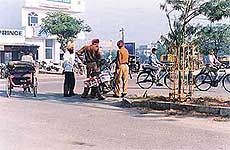 A PCR motor cycle team tells the public about the police campaign to widen roads in the Focal Point area of Ludhiana, on Friday.