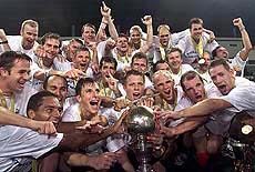 German players celebrate with the trophy 