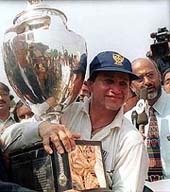 Victorious Railways skipper Abhay Sharma with the Ranji Trophy