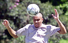 Brazilian soccer star Ronaldo heads the ball during a training session in Teresopolis.