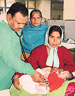 Dr Ram Samujh checks the first child in North India to be treated for Hirschsprung disease using the new single stage technique at the PGI in Chandigarh on Monday.