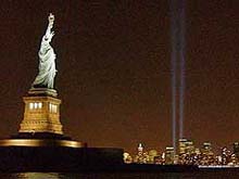 wo columns of light (R), intended to resemble the World Trade Center towers