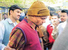 The UT Assistant Excise and Taxation Commissioner, Mr S.P. Kansal, being produced in a local court in Chandigarh on Wednesday.