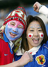 Two fans visited Kwangju to cheer their respective national soccer teams