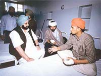 The Chief Minister, Capt Amarinder Singh, talks to injured patients 