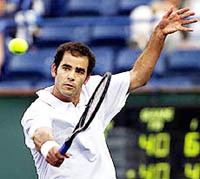 Pete Sampras of the USA returns a shot against Albert Costa of Spain.