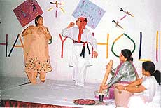 Members of the Ramgarhia Ladies Club perform at a function organised in connection with Holi, 