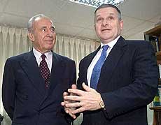 US West Asia envoy Anthony Zinni (R) meets Israeli Foreign Minister Shimon Peres