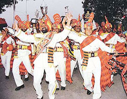 The team of the BSF Delhi band is jubilant after winning the overall trophy in the Third All-India Police Band Competition in Pinjore on Saturday. 