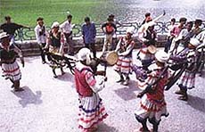 Folk dancers in a fair at Varahidevi Temple, Devidhura.