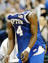 Hampton's David Johnson covers his head 