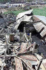 The dormitory of a madrasa (Islamic religious school) for girls is left ravaged after an early morning blaze in Dhaka