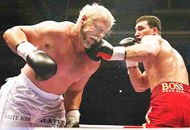 Wladimir Klitschko of the Ukraine (R) lands the knockout punch
