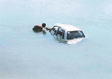 A diver ties a rope to the