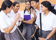 Students of Modern School are all smiles after the end of their Class X Board examination in the Capital on Monday.