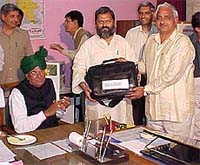 Haryana Vidhan Sabha Speaker Satbir Singh Kadian gives away laptop and printer