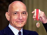 British actor Sir Ben Kingsley smiles after receiving his Knighthood