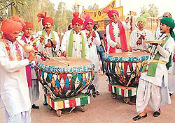 Musicians in front of Kala Gram, which is hosting Craft Bazaar in Chandigarh on Wednesday.