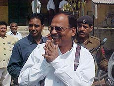 A former Director-General of Police, Haryana, Mr S. P. S. Rathore, outside a court