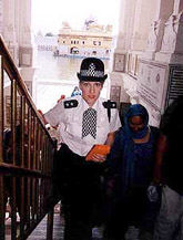 A lady member of a 50-strong British Police delegation 