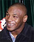 Boxer Mike Tyson laughs