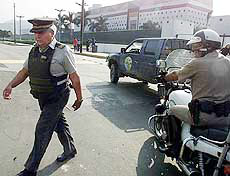 The Peruvian police patrols in front of the US Embassy building in Lima 