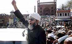 Muslim leader Maulana Syed Ahmed Bukhari leads a march from Jama Masjid in New Delhi on Friday.