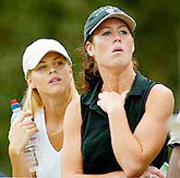 Tiger Woods' girlfriend Elin Nordegren (L) of Sweden 